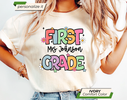 Cute First Grade T-Shirt – Colorful Back to School Shirt with Flowers and Stars for Kids or Teachers